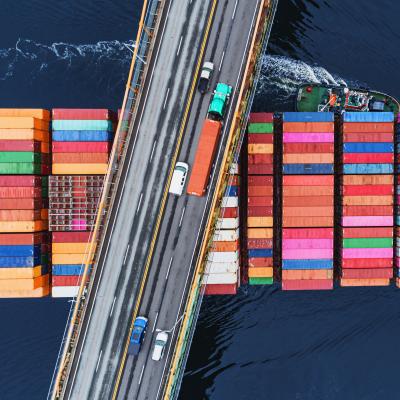 A highway bridge over a cargo ship